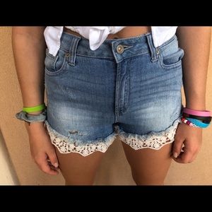 justusa jean shorts with cute design on pockets